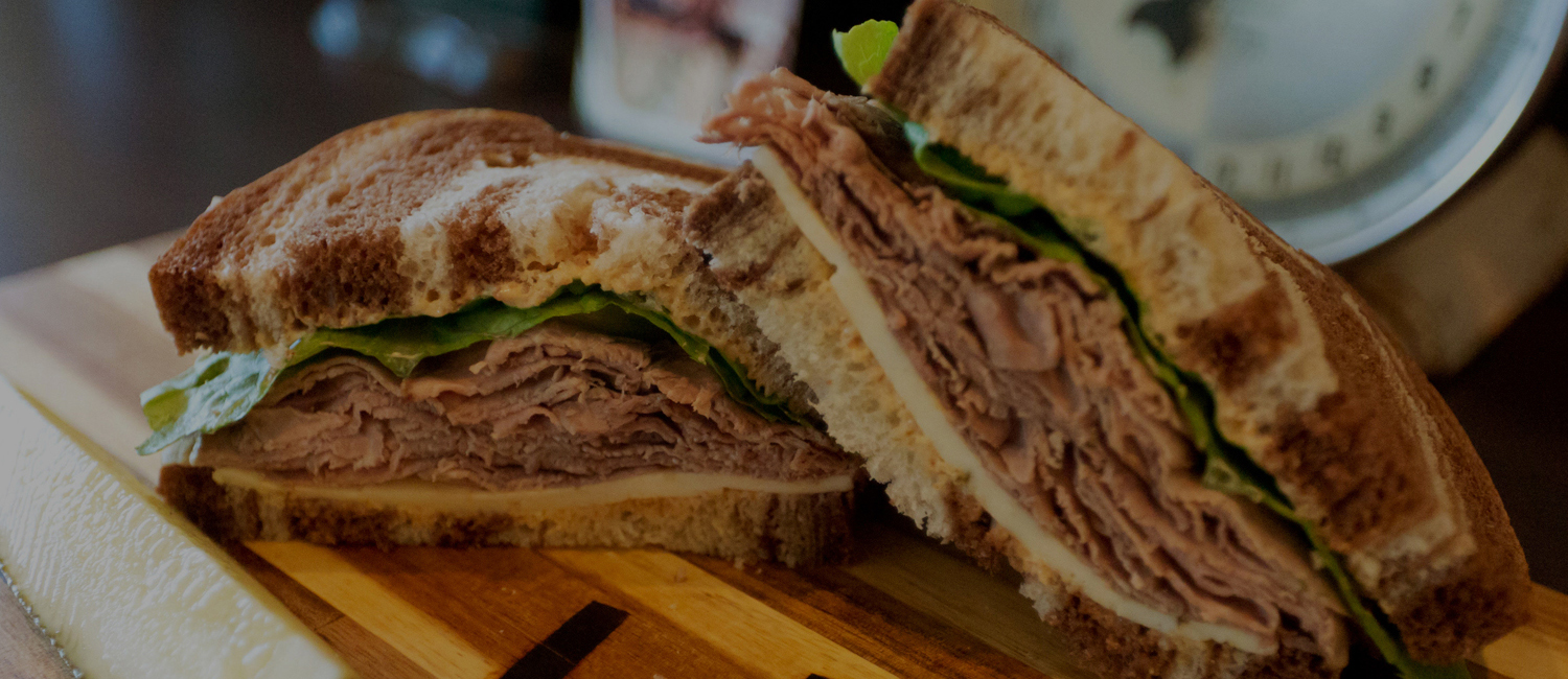 Photo of corned beed sandwich on marble rye